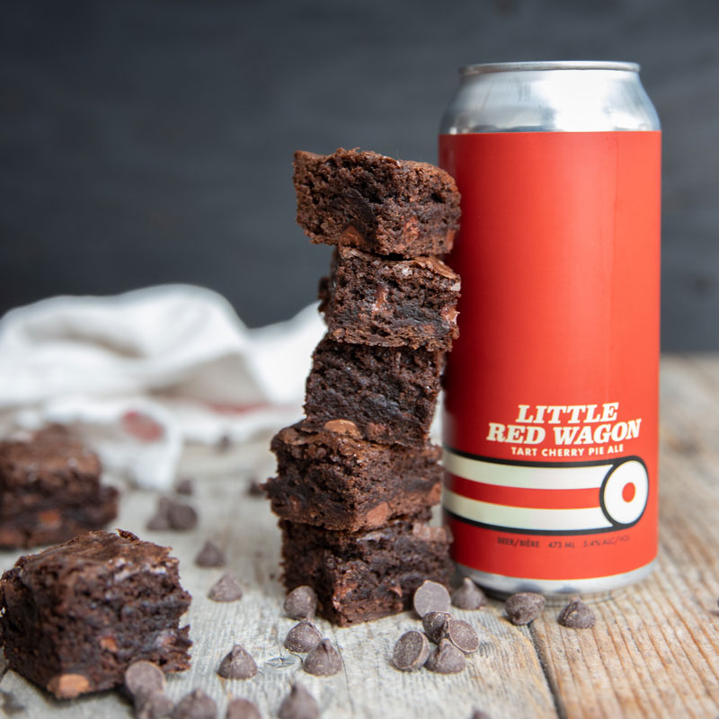 Little Red Wagon beer can next to a stack of brownies